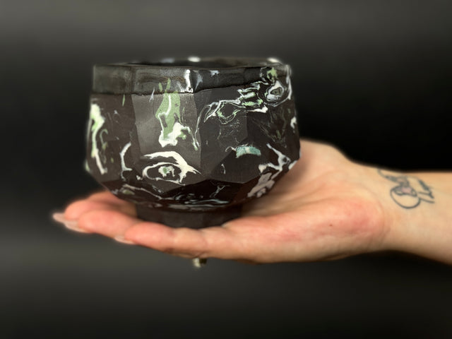 Black, white and green porcelain tea bowl; chawan
