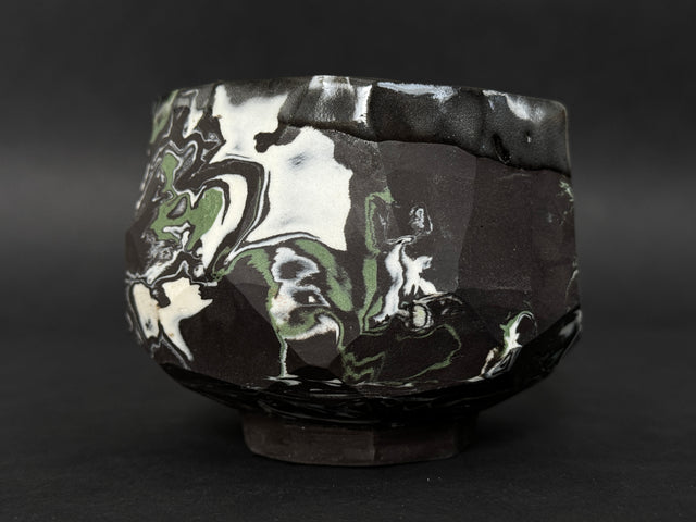 Black, white and green porcelain tea bowl; chawan