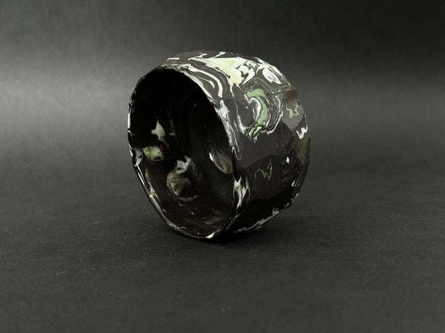 Black, white and green porcelain tea bowl; chawan